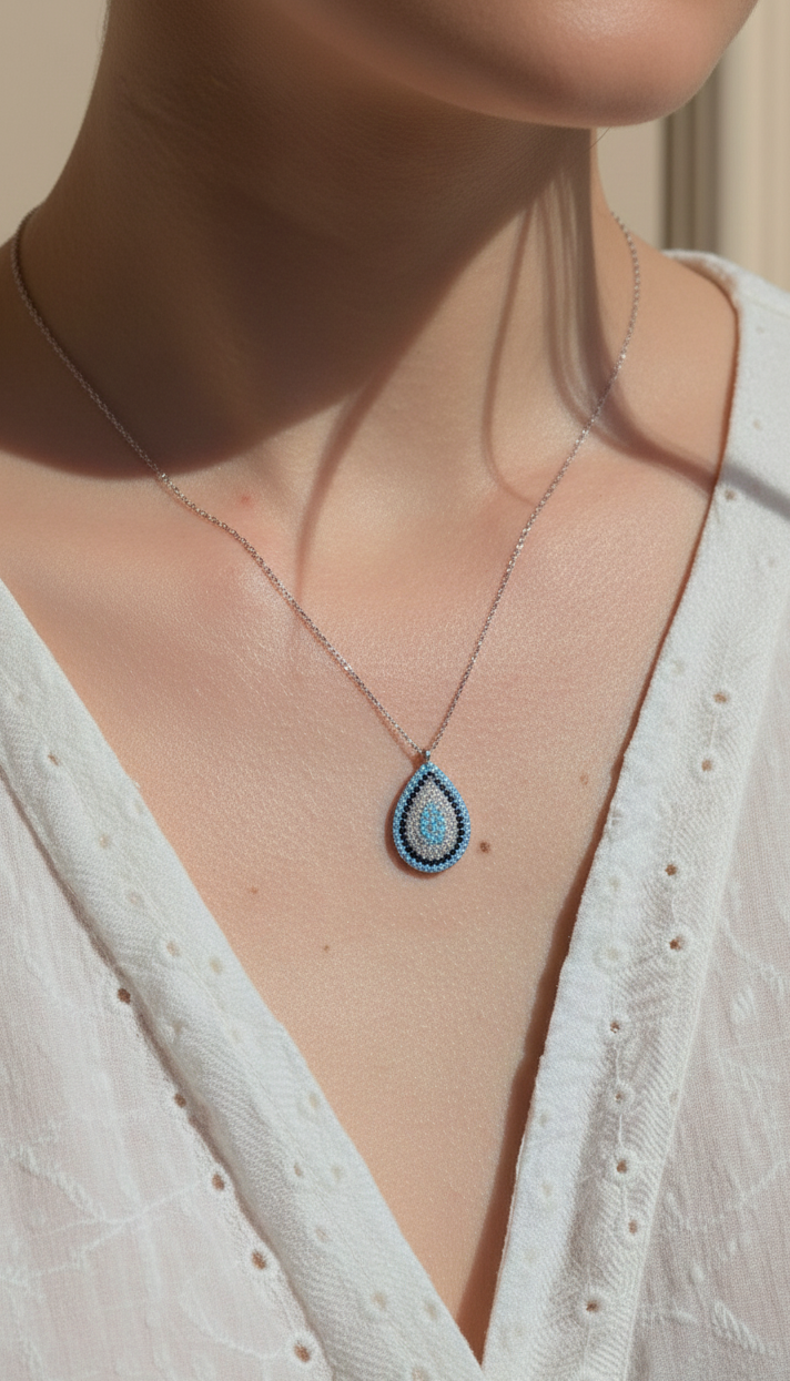 Pendentif Étoile d'Argent: Larme Azurée